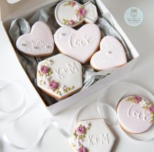 Engagement cookies shaped like heart and engagement ring in a pretty box