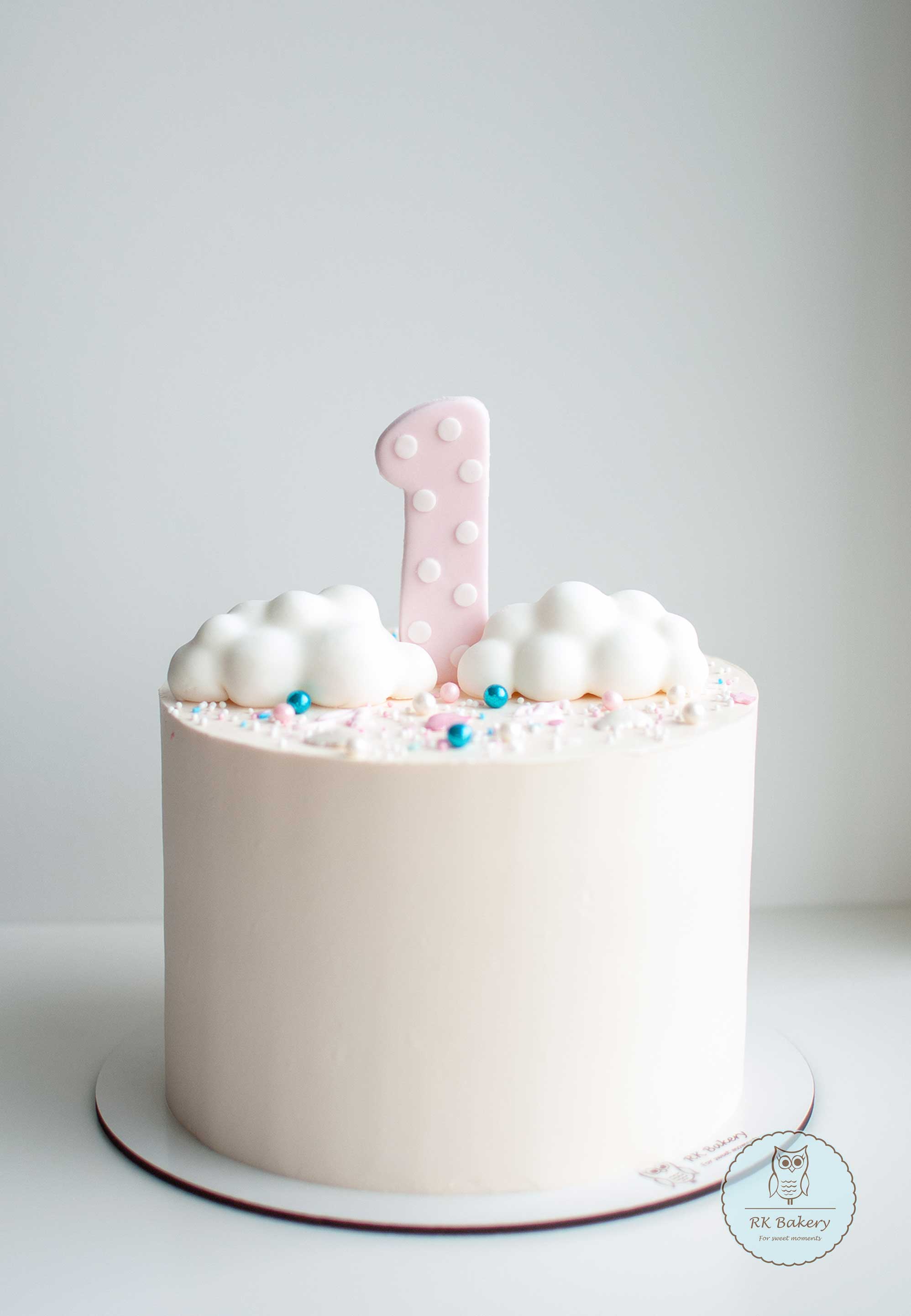 First birthday cake with clouds
